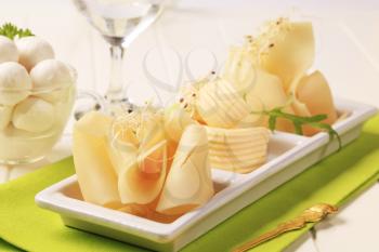 Thin slices of Swiss cheese and butter
