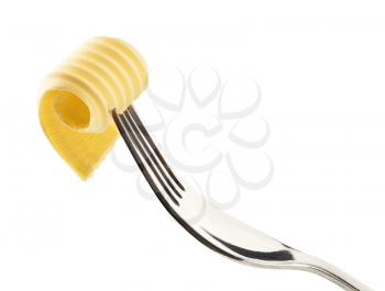 Single butter curl on a metal fork 
