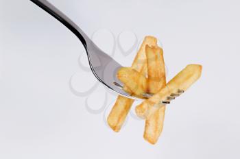 French fries on a fork
