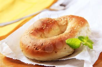 Fresh bagel with sesame seeds on top