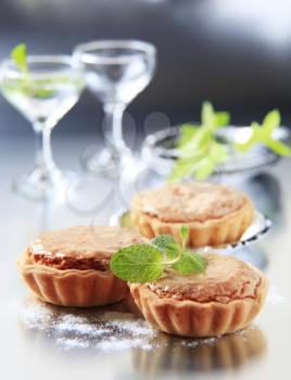Sweet tartlets with nut and marzipan filling 