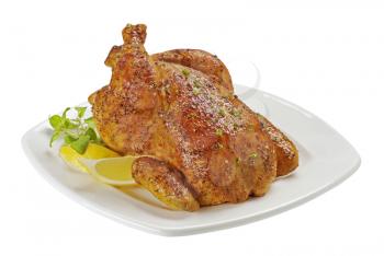 Roasted chicken seasoned with herbs and spices
