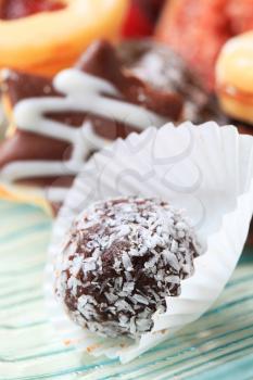 Coconut-coated chocolate ball in paper cases
