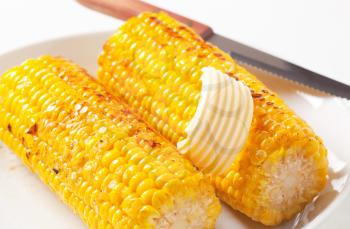 Roasted corn on the cob with butter
