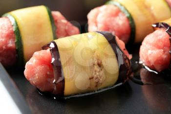 Minced meat wrapped in slices of eggplant and zucchini
