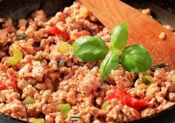 Detail of ground meat stir fry in a pan