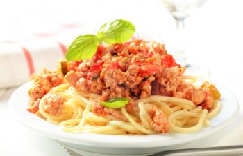 Minced meat sauce served on a bed of cooked spaghetti