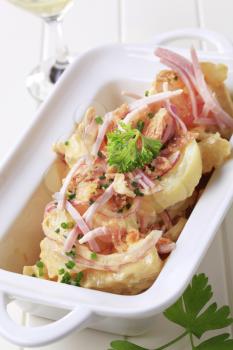 Mustard potato salad with ham and cracklings