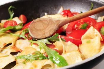 Vegetarian pasta stir fry in a pan