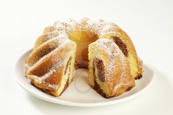 Marble cake sprinkled with powdered sugar
