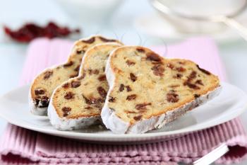 Slices of stollen with raisins and candied fruit