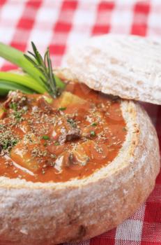 Goulash soup in a bread bowl - detail