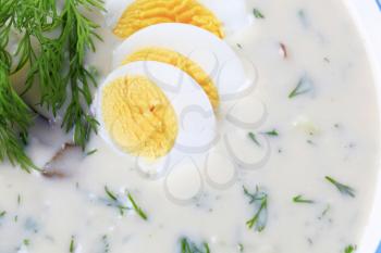 Cream soup with dill, mushrooms, potatoes and boiled egg