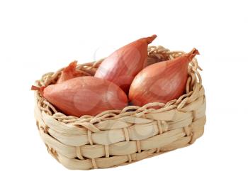 Bulbs of fresh onion in a basket