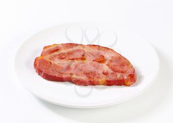 Slice of smoked pork neck