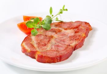 Slice of smoked pork neck
