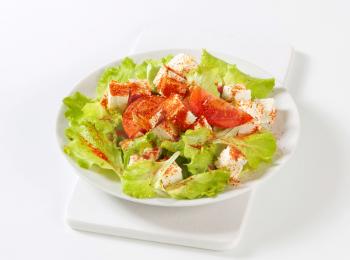 Diced feta cheese with fresh lettuce and tomatoes