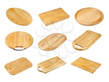 Various wooden cutting boards isolated on white