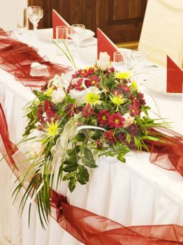 Tables set for a festive dinner -  Floral decoration 