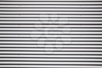 Macro shot of corrugated metal sheet
