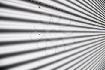 Macro shot of corrugated metal sheet
