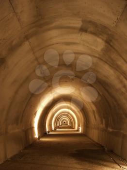 Inside a long tunnel - receding 