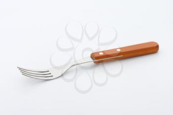 dinner fork with wooden handle