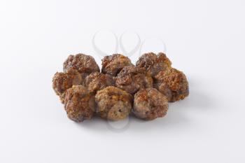 group of meatballs on white background