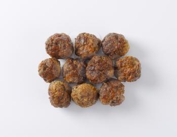 group of meatballs on white background