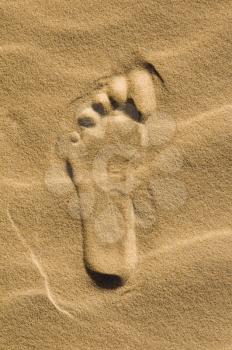Footprint in the sand - closeup view