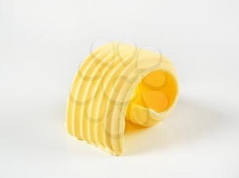Curl of fresh butter - studio shot
