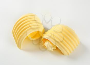 Curls of fresh butter - studio shot