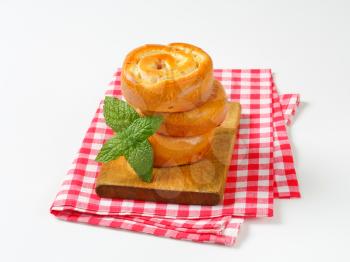Yeast buns with apple and custard filling