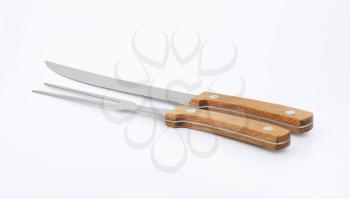 Wood-handled carving knife and fork set