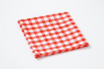 red and white checkered cloth napkin