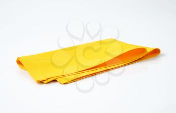 yellow place mat on white background