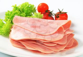 Stack of thinly sliced ham
