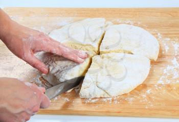 Cook making yeast pizza dough