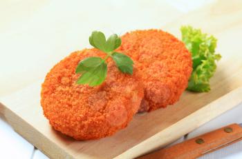 Fried cheese, minced meat or vegetable patties 