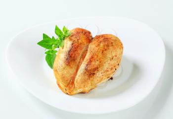 Chicken breast rubbed with garlic paste 