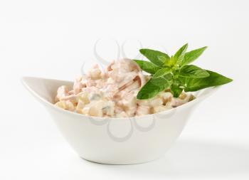 Bowl of ham and potato salad