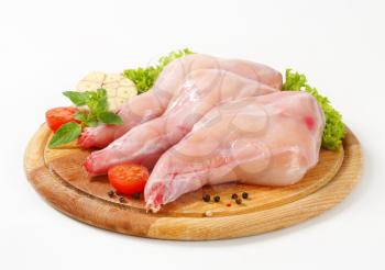 Fresh rabbit meat on cutting board