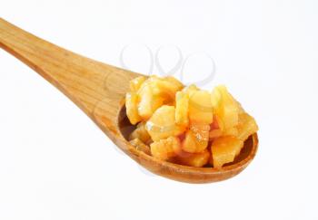 Pork greaves on wooden spoon