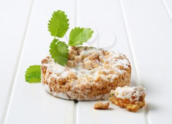Apple crumble cookie dusted with icing sugar