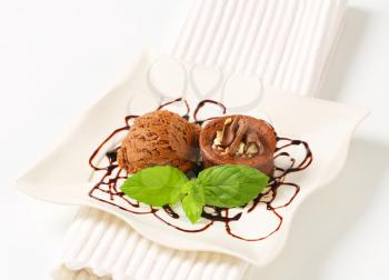 Mini chocolate cake and scoop of ice cream