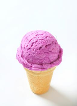 Blueberry ice cream cone - studio shot