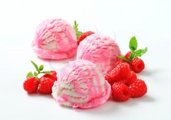 Scoops of raspberry yogurt ice cream 