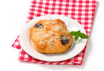 Sweet pastry wrap filled with plum jam