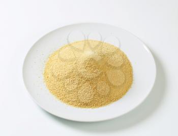Dry bread crumbs on plate