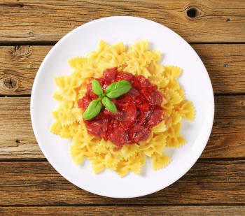 Bow-tie pasta with thick tomato sauce